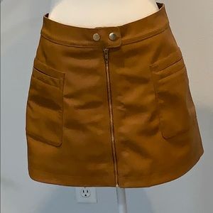 Free People faux leather tan skirt.  Size 6